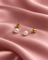 Tiny Pearl Studs in Gold Tone