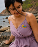 Snuggle Pup Brooch in Blue and Yellow - Styled View