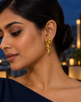 Twisted Flame Earrings in Gold Tone - Styled View