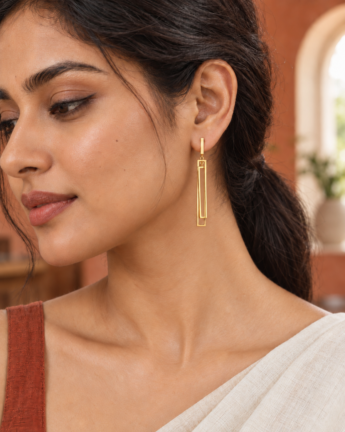 Sleek Horizon Earrings in Gold Tone - Styled View