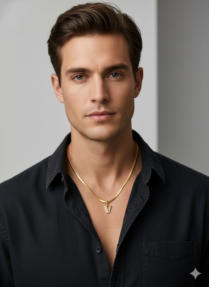 Aura Bling gold V alphabet pendant Men necklace against a gray background