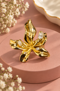 Petal Sculpture Ring with gold-tone flower and four clear stone accents