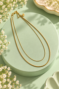 Quiet Luxe Necklace with fine inner and thicker outer gold-tone chains