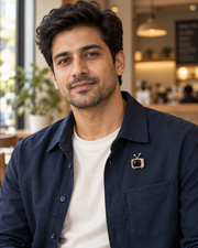 Male model wearing Retro Rewind Brooch on a navy overshirt