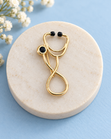 The Doctor’s Pride Brooch in Gold Tone