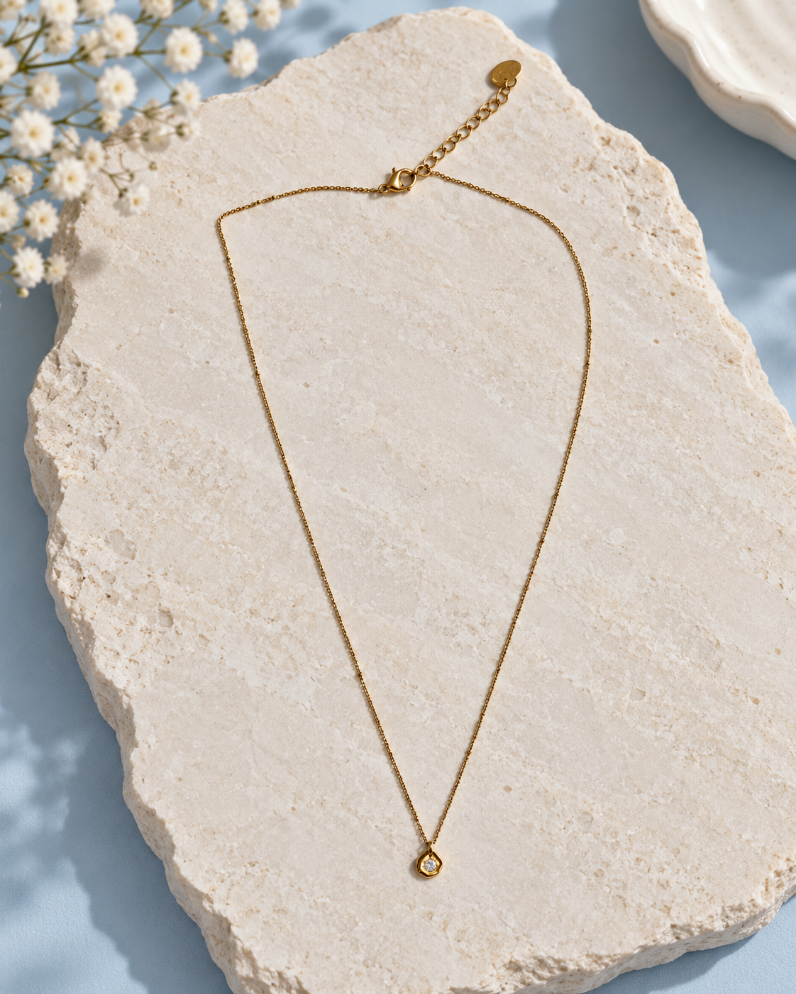 The Quiet Spark Necklace in Gold Tone
